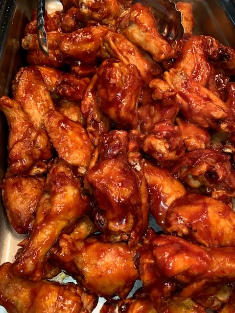 A tray of barbecue chicken wings