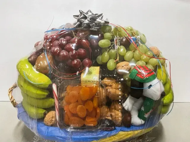 A holiday fruit and gourmet gift basket