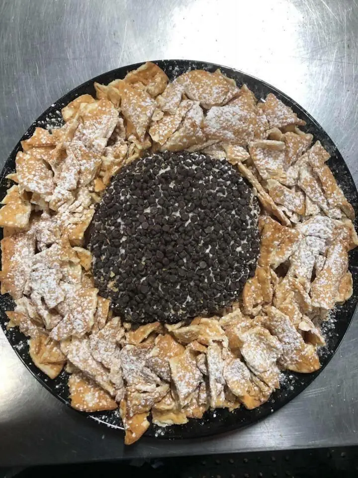 A catering platter of powdered pastries