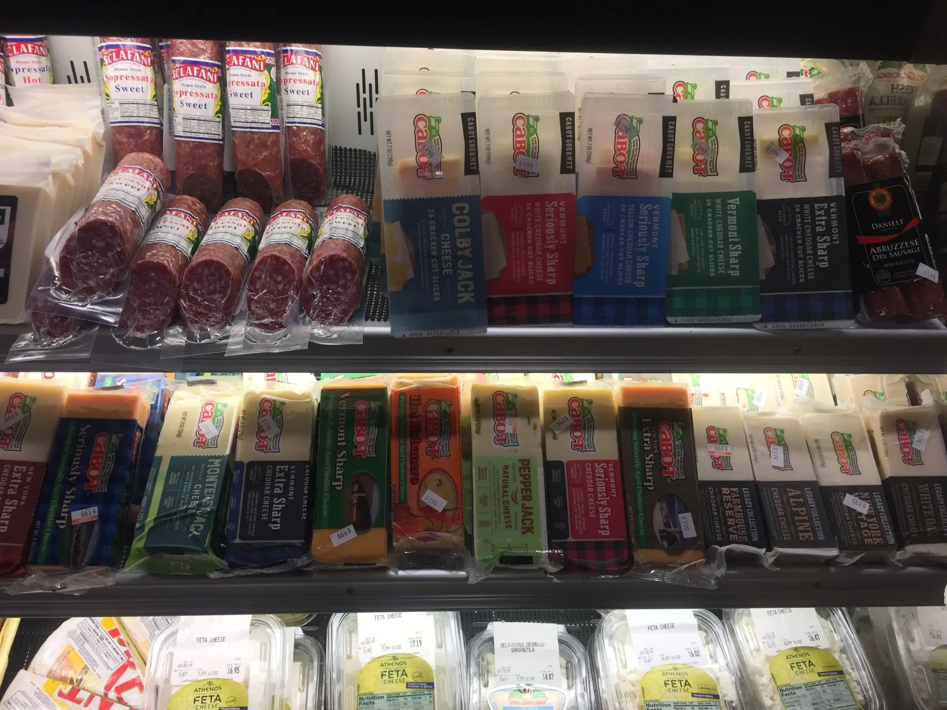 Specialty cheeses in the cheese case