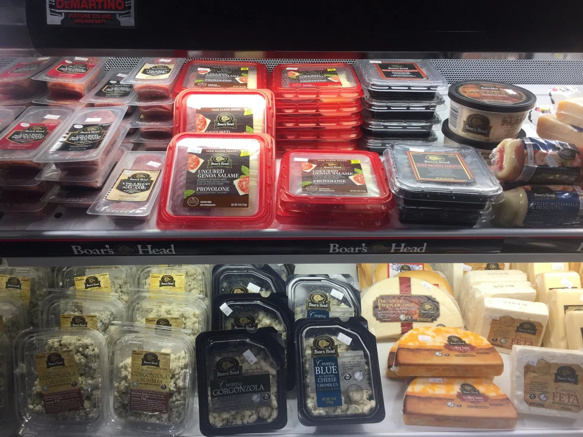 Cheese wedges arranged in the case