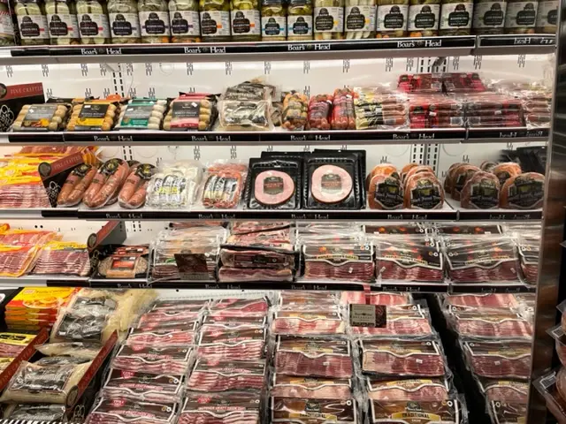 Packaged deli meats along the refrigerated aisle