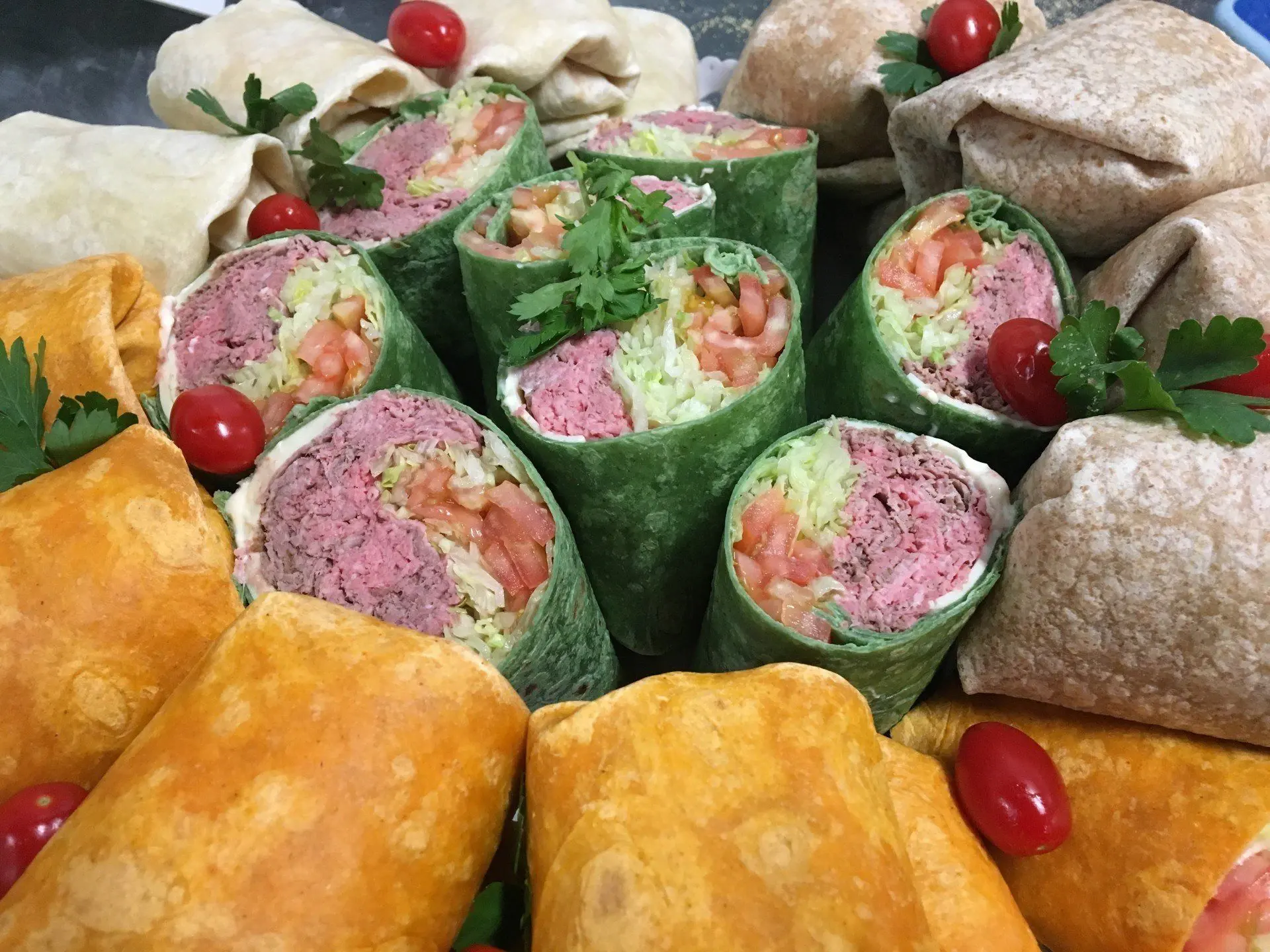 Freshly made deli wraps cut and plated