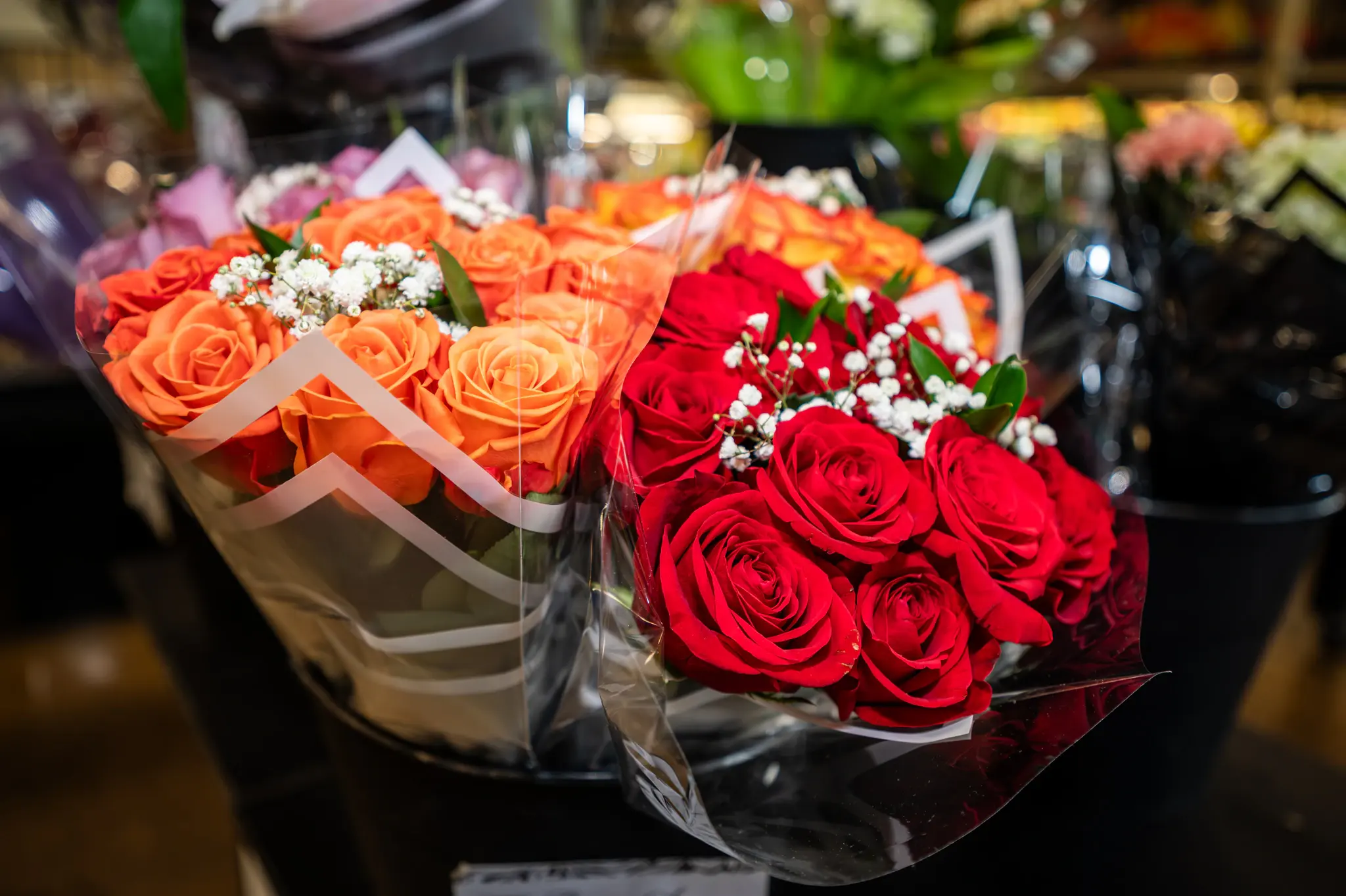 A fresh cut flower arrangement in red and white