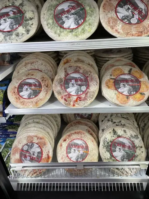 Fresh cheeses in the refrigerated case