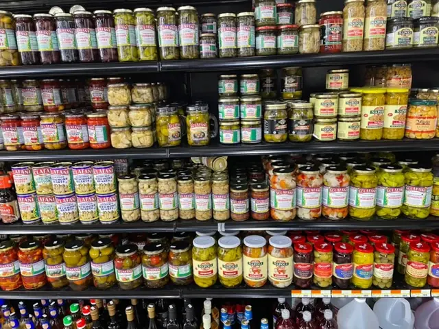 Shelves of jarred specialty groceries