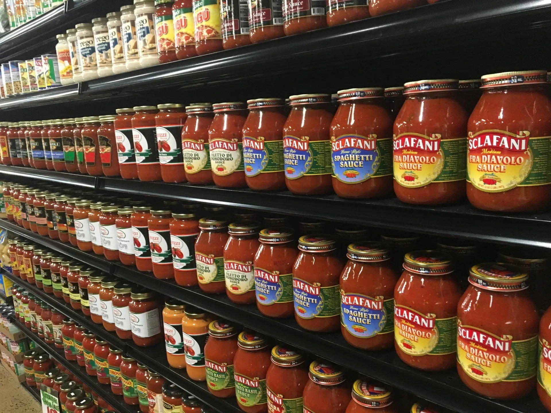 Shelves of Italian tomato sauces