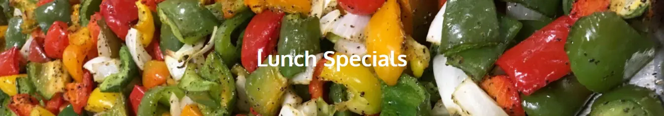 Roasted peppers and onions behind a Lunch Specials banner