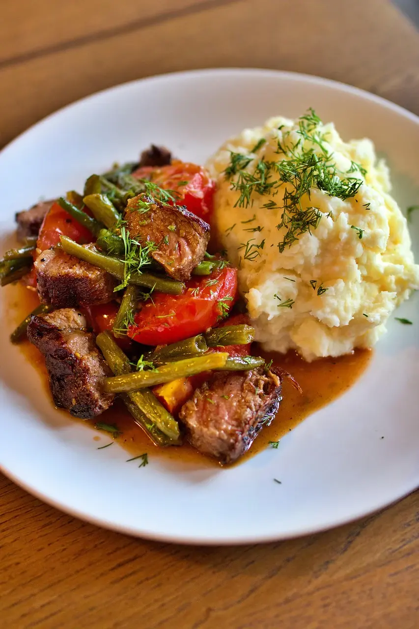 A plated chicken dinner from the hot food case