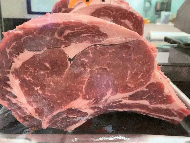 Bone-in ribeye steaks cut in store