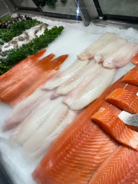 Fresh mussels in the seafood case